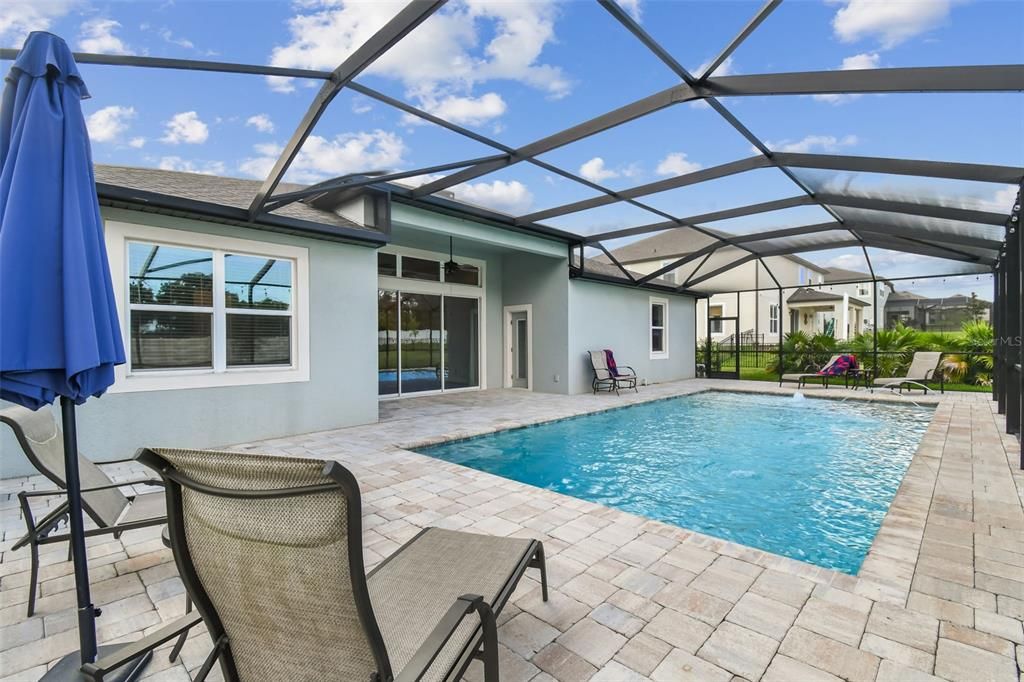 Screen enclosed Lanai and Salt-Water Pool.