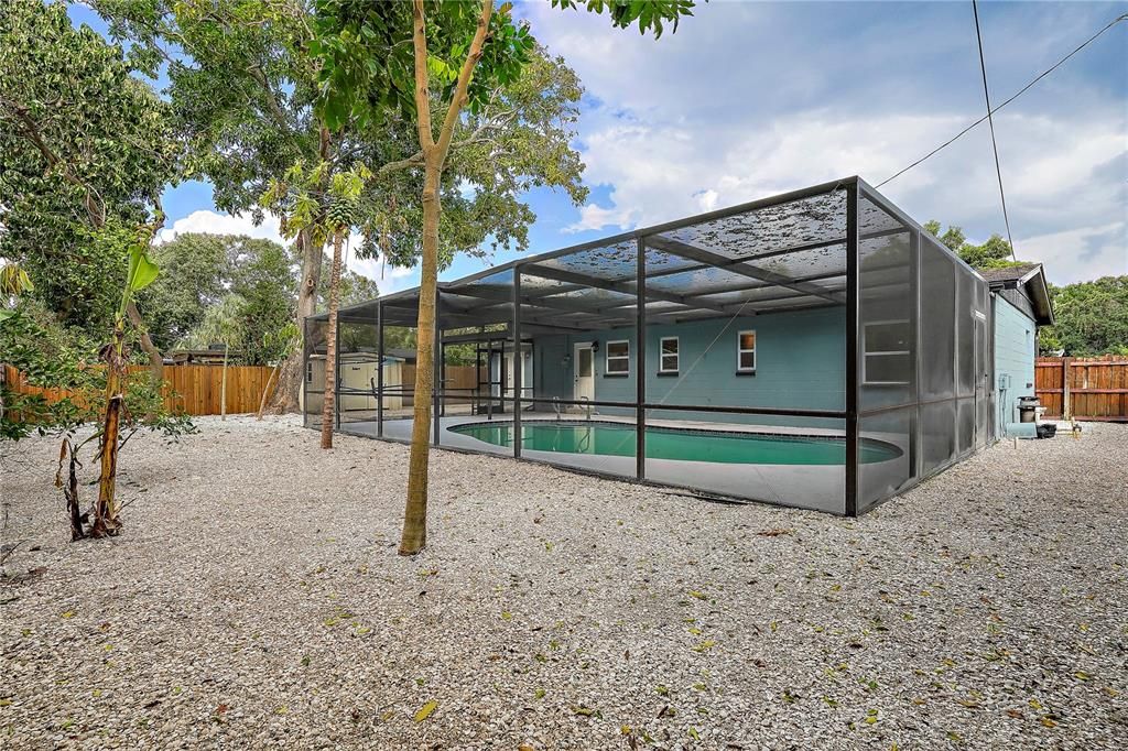 View of pool area from the rear yard