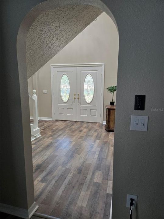 And the Stunning Archway Creating a Nook between Living Rm and Entrance