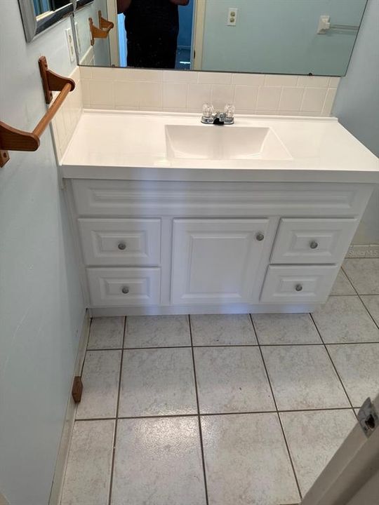 New Bath vanity & faucet