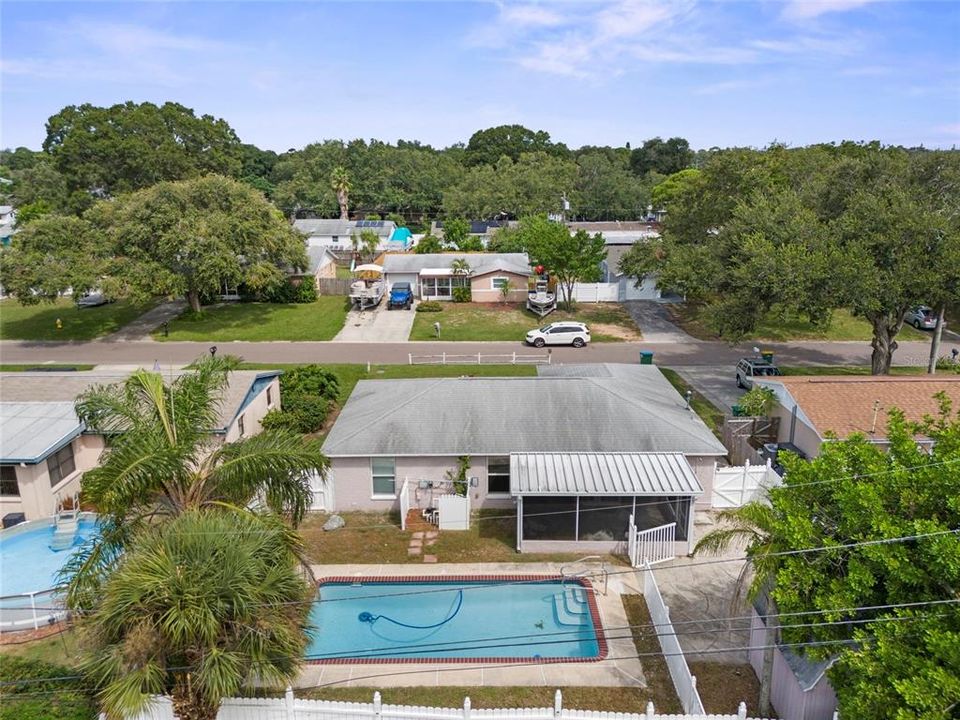 Aerial view of back of house and pool