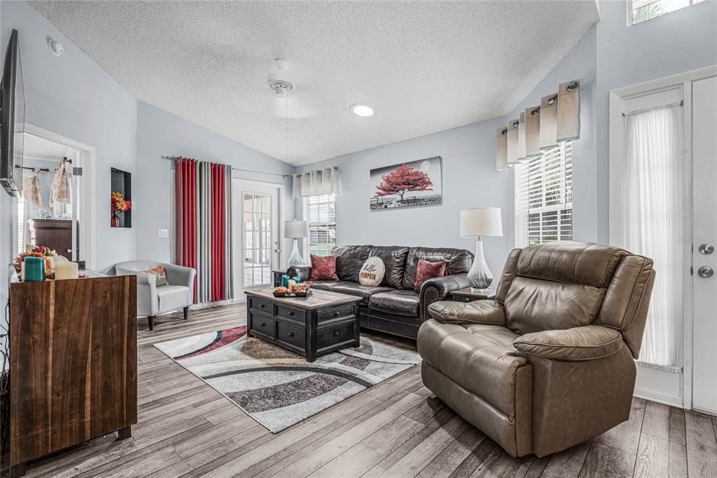 Living Room w/ Vaulted Ceilings