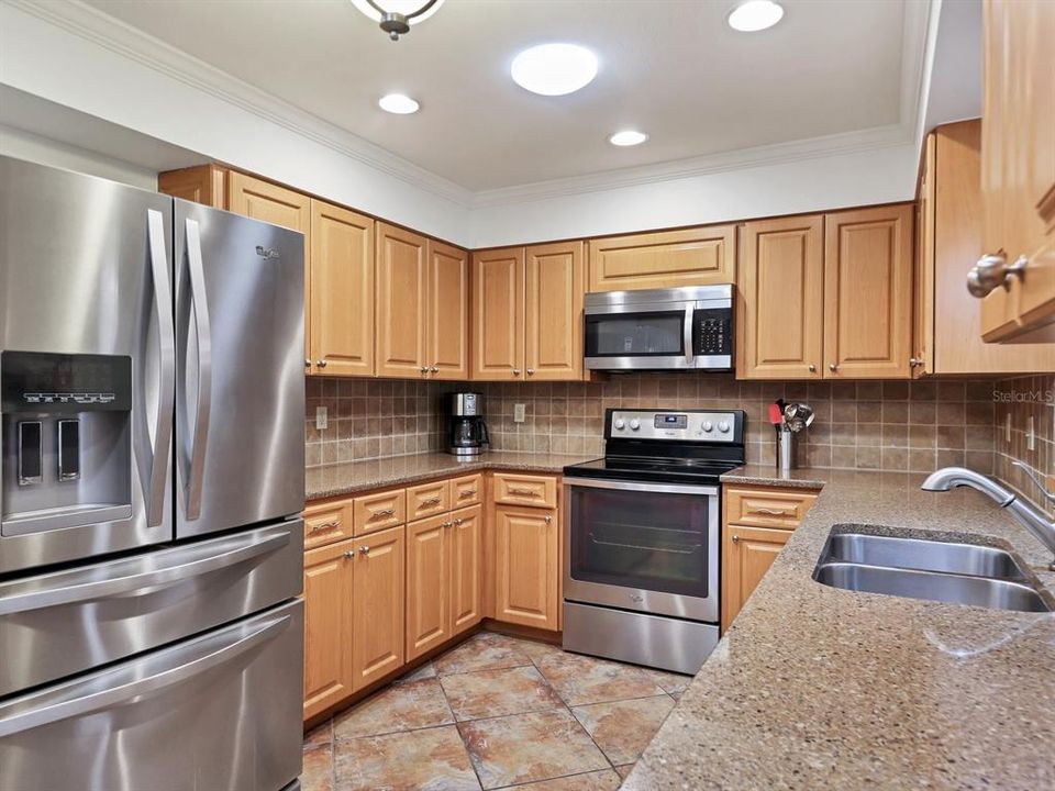 Granite counters and kitchen layout help make cooking easier