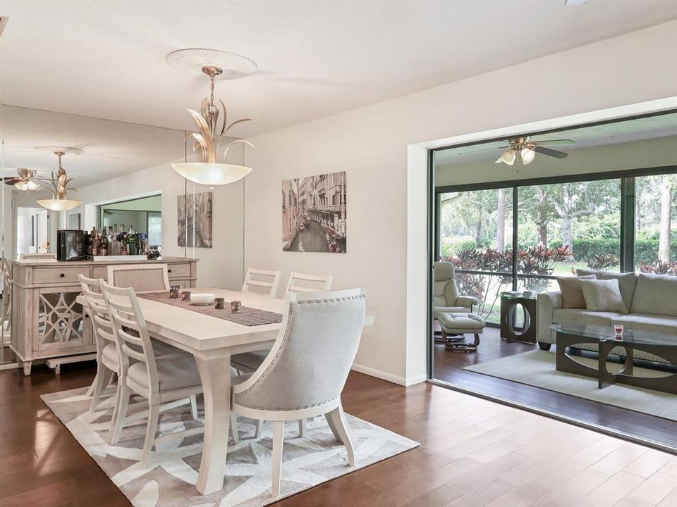 same mahogany floors continue throughout dining