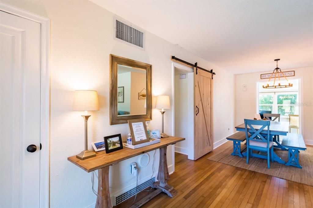 Hardwood floors greet you and lots of natural light in this cozy beach cottage!