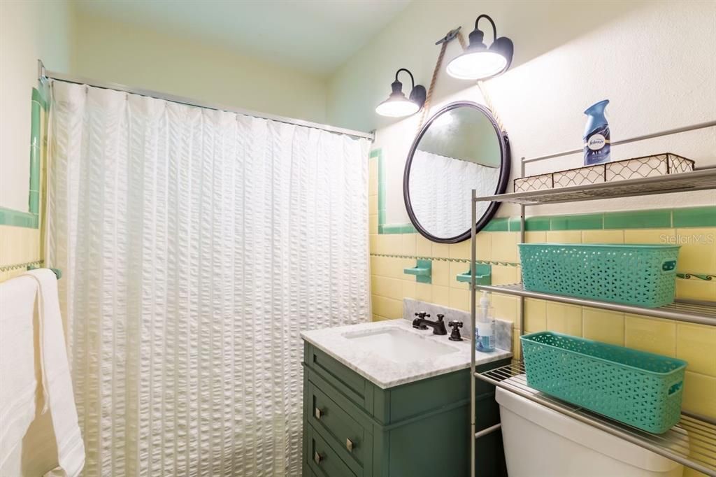 Fun main bathroom is coastal and chic!