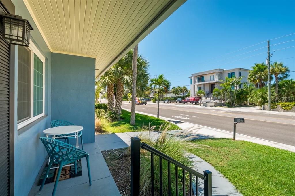 Cute front porch where you can sip ice tea and enjoy those sweet Gulf breezes!