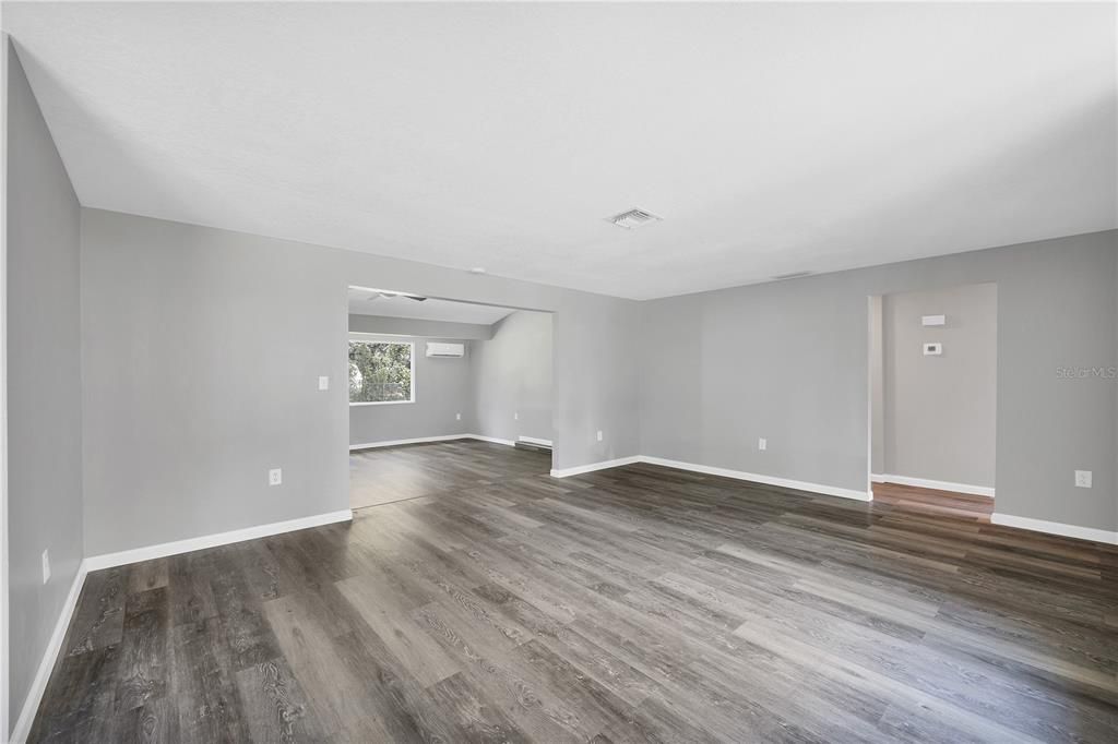 Living room, hall to bedrooms to the right, step down into family room straight ahead