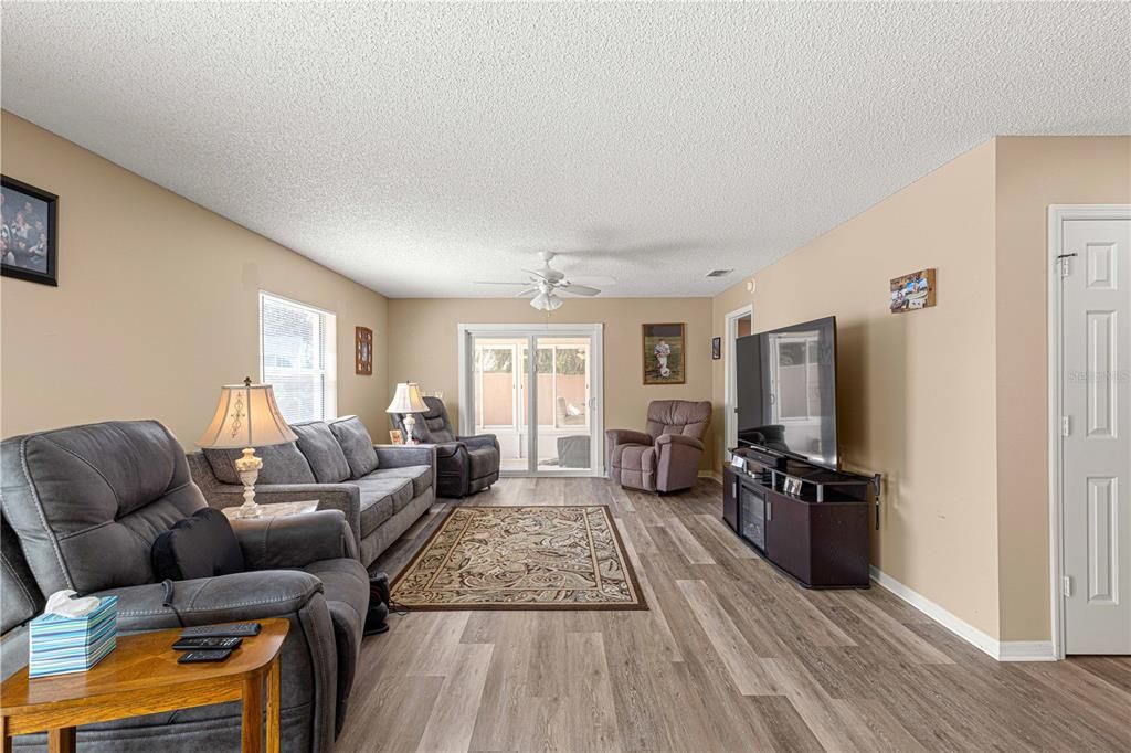 VIEW OF THE LIVING ROOM FROM THE DINING AREA