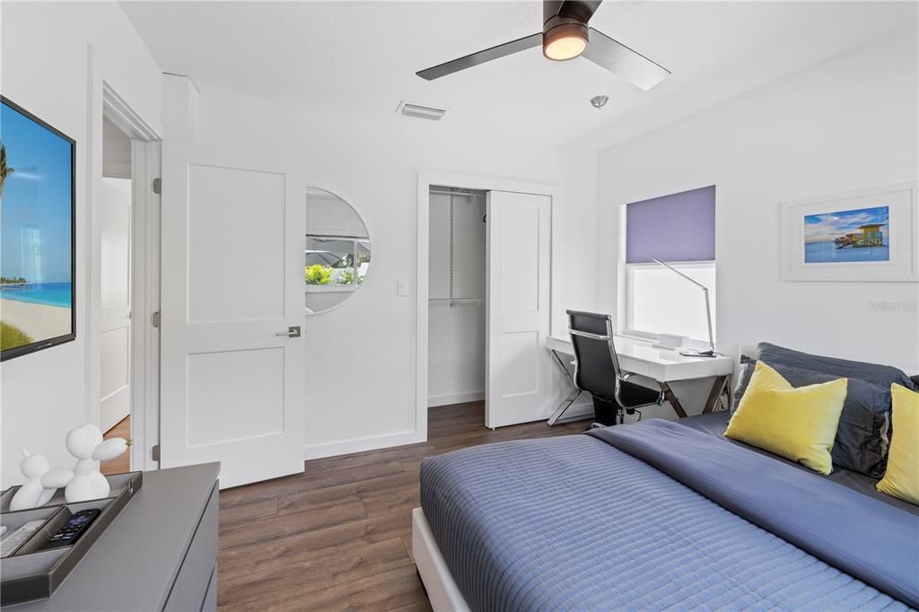 first guest bedroom facing the pool area