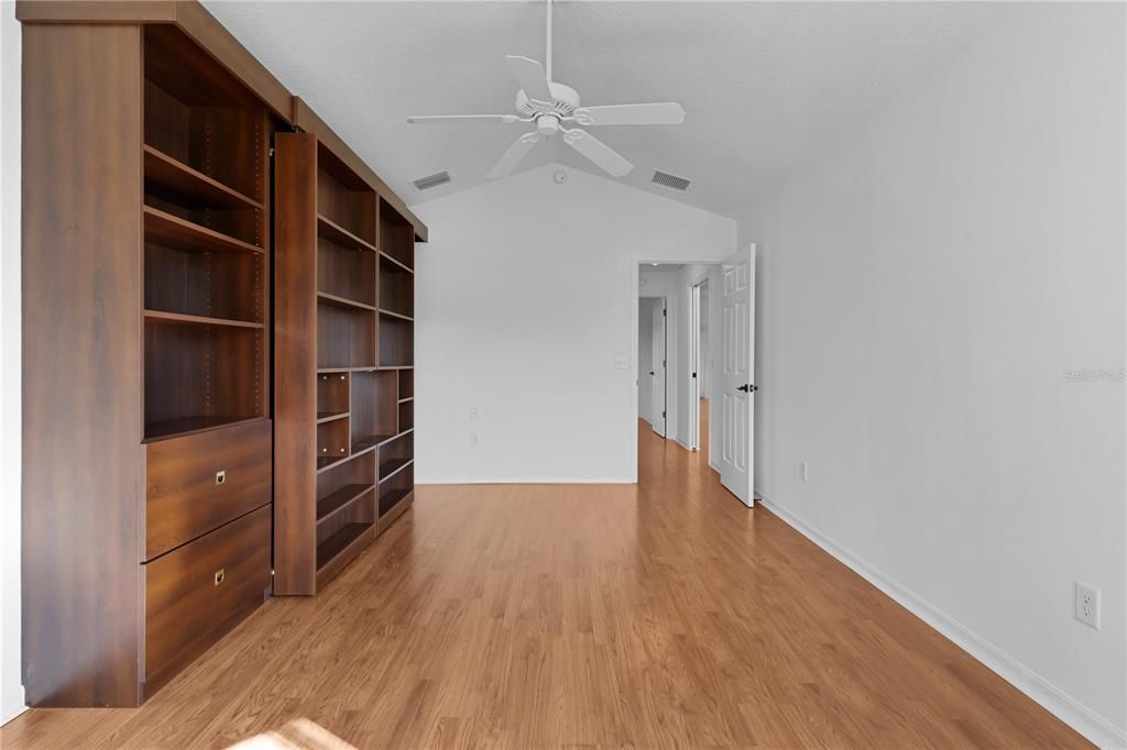 Murphy Bed with Bookcases that Slide to Reveal the Bed