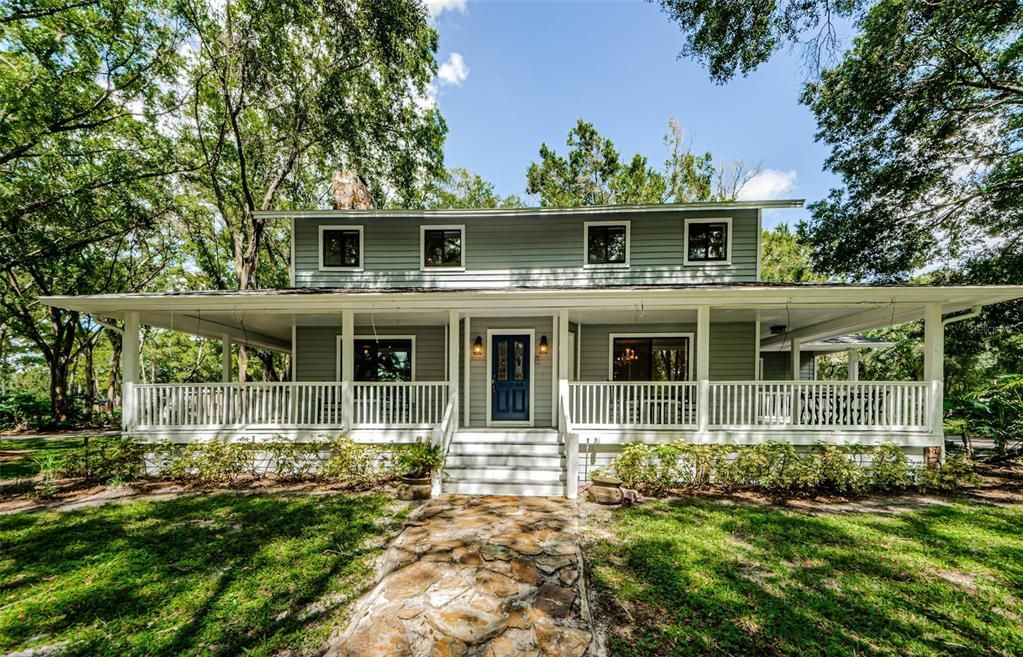 Beautiful Farmhouse with the front porch to die for!