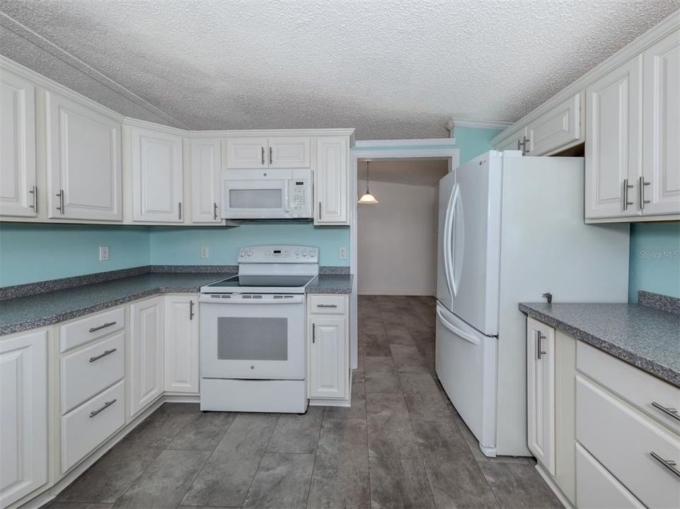 Kitchen with entrance from the dining room.