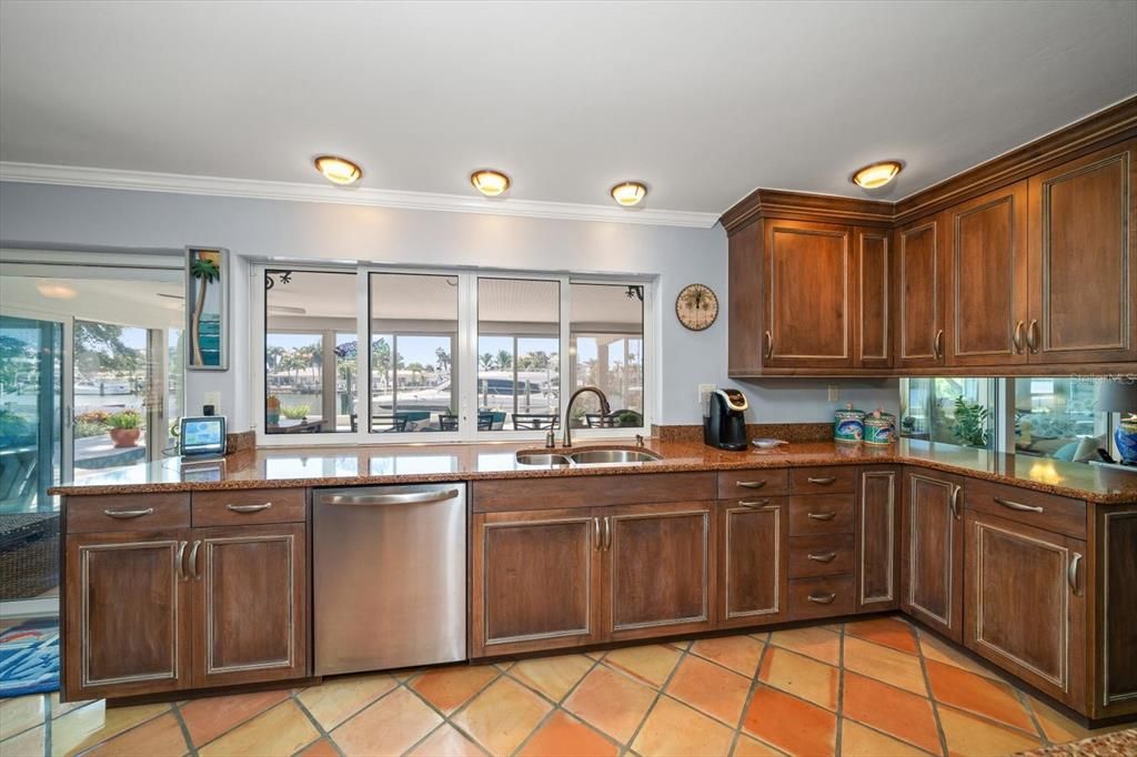 Kitchen looking out to the lanai, pool, and intracoastal.