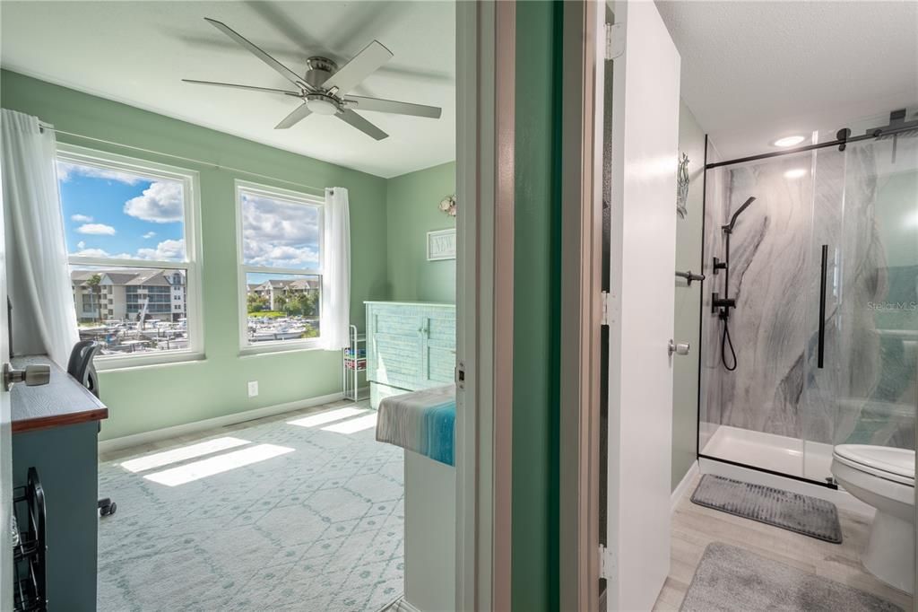 Bathroom 2 is adjacent to the 2nd bedroom.