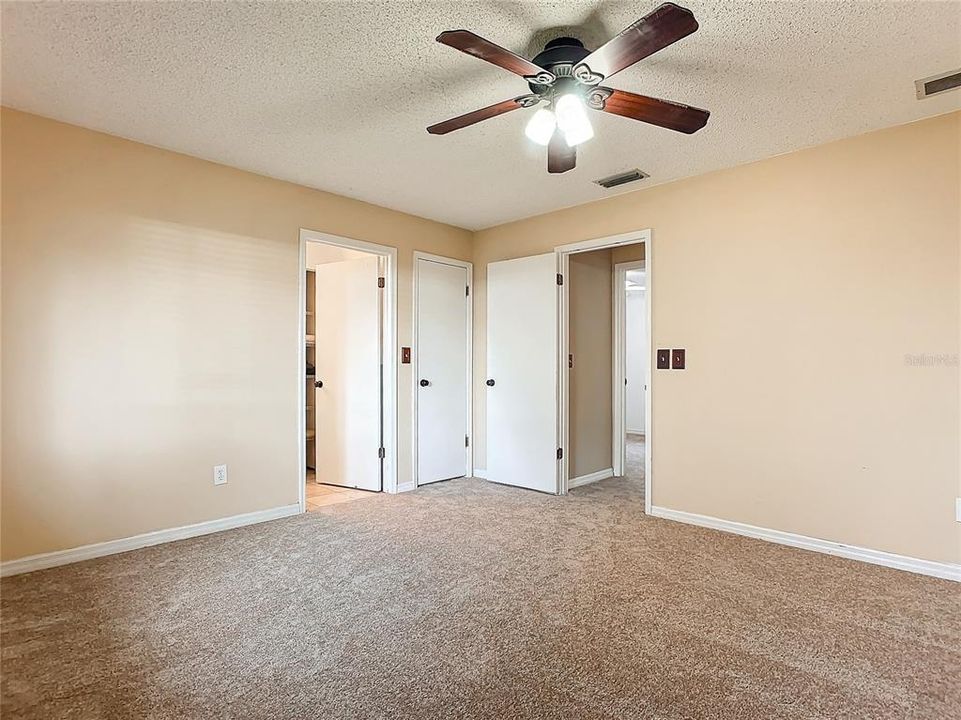 main bedroom has a large walk in closet