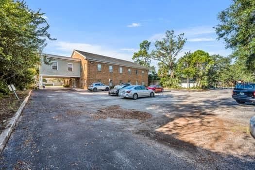 Rear Of Building and Parking Lot