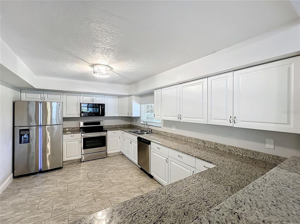 Kitchen / Granite Counter Tops and Stainless Steel Appliances