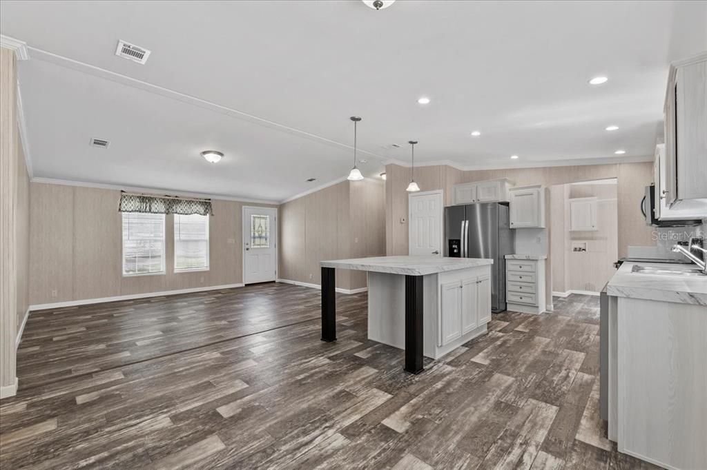 Kitchen w/view of laundry room & living room