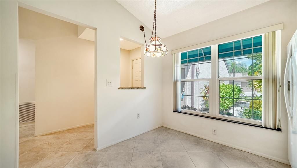 Kitchen window with impact glass