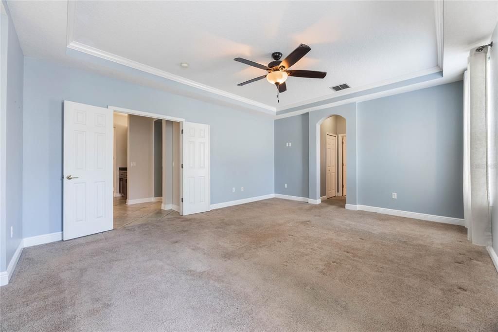 Primary suite with French doors is on first floor, off of the dining room. Carpets to be steam cleaned prior to tenant move-in.