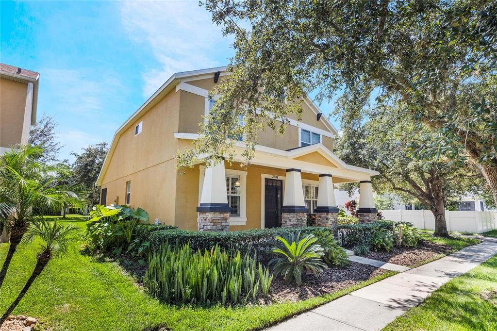 Lush landscaping and mature trees make this home one you'll love coming back to every day!