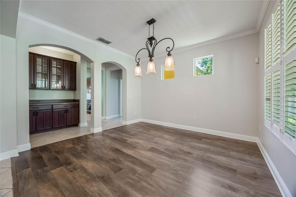 Dining room with built-in butler pantry.