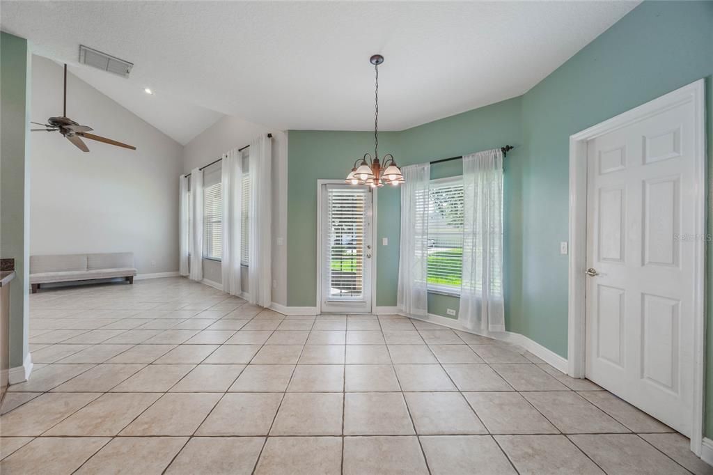 Eat-in kitchen area with door to laundry room/garage.