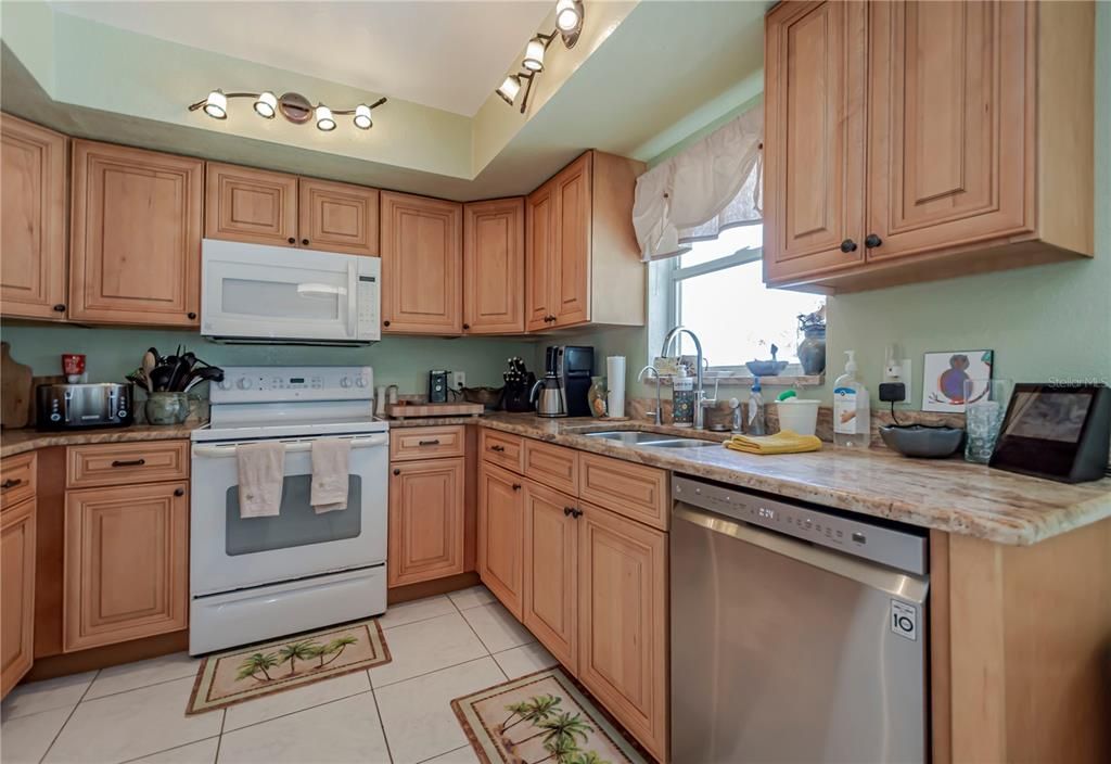 Large window in the kitchen gives additional light.