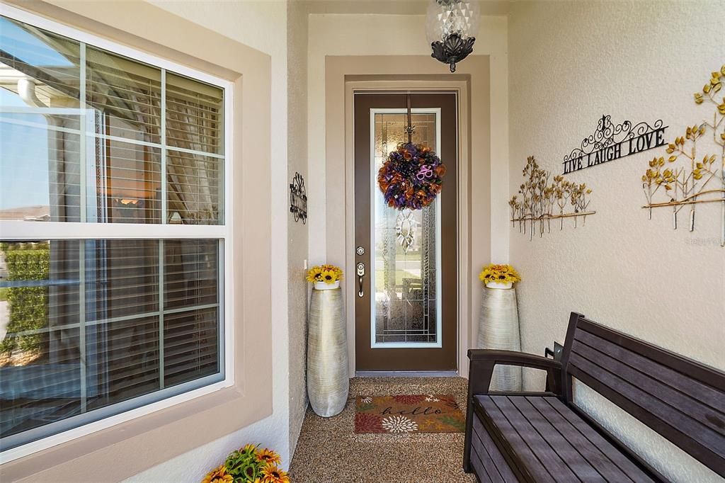 Screened In Front Porch with Chattahoochee Pebbled floor, Beautiful 8 Feet Tall Doors throughout House, Front Door Is 8 ft Tall with  Lead Glass Design.