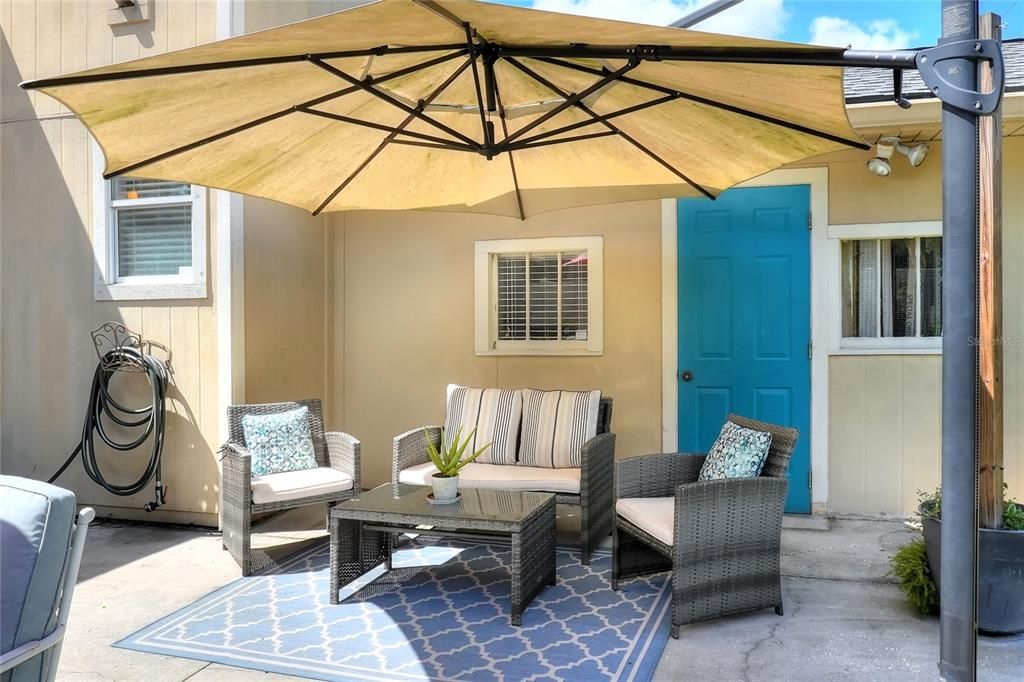 There's plenty of space for a whole outdoor living room (this one backs up to the laundry room)!