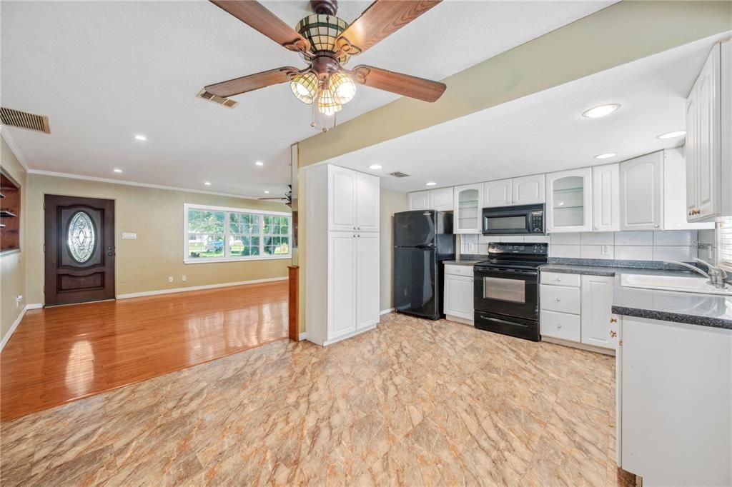 Kitchen opens to the dining room and living room