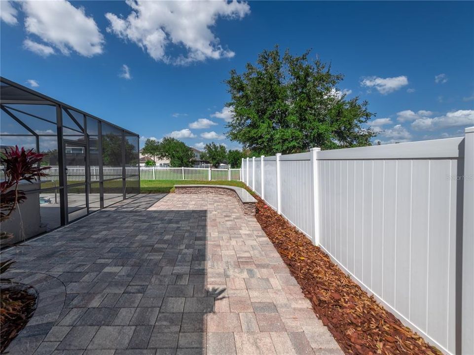 Pavered courtyard with built-in bench seating