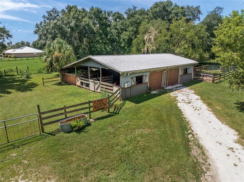 For the equestrian buyer there is an oversized barn with 3 stalls but it could accommodate up to 7 stalls. There is also a feed room and a tack room.