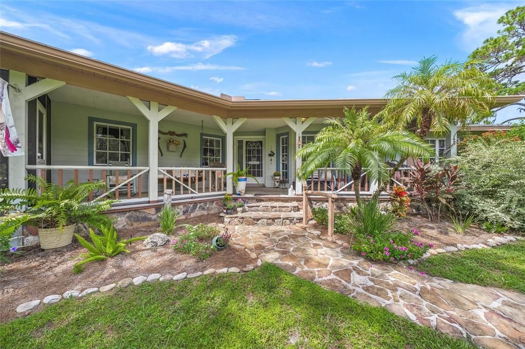 This custom home has 143 feet of wraparound porch.