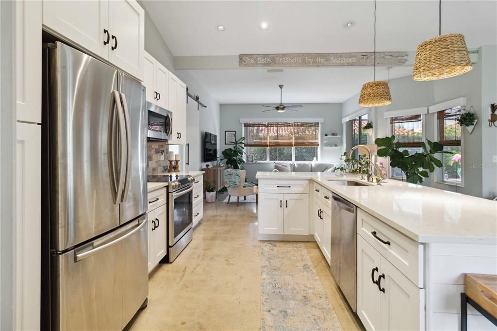 Overview of the kitchen & the living room.