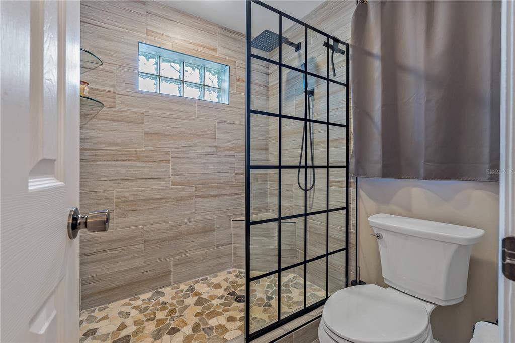 BEAUTIFULLY APPOINTED WALK-IN SHOWER & GLASS DOOR IN PRIMARY BATH!