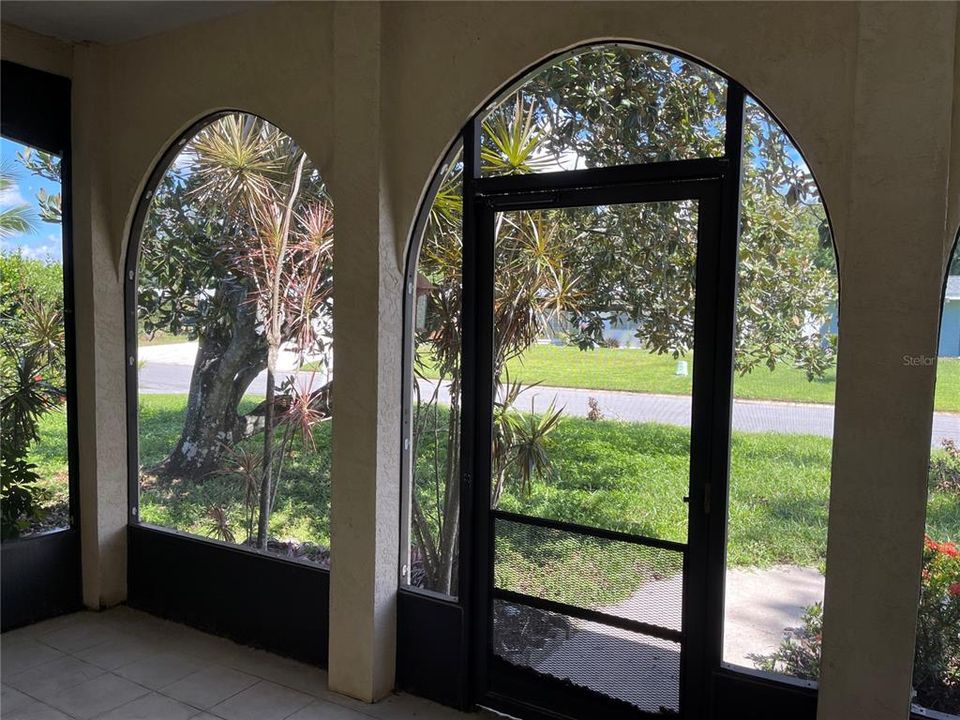 The screened-in porch.