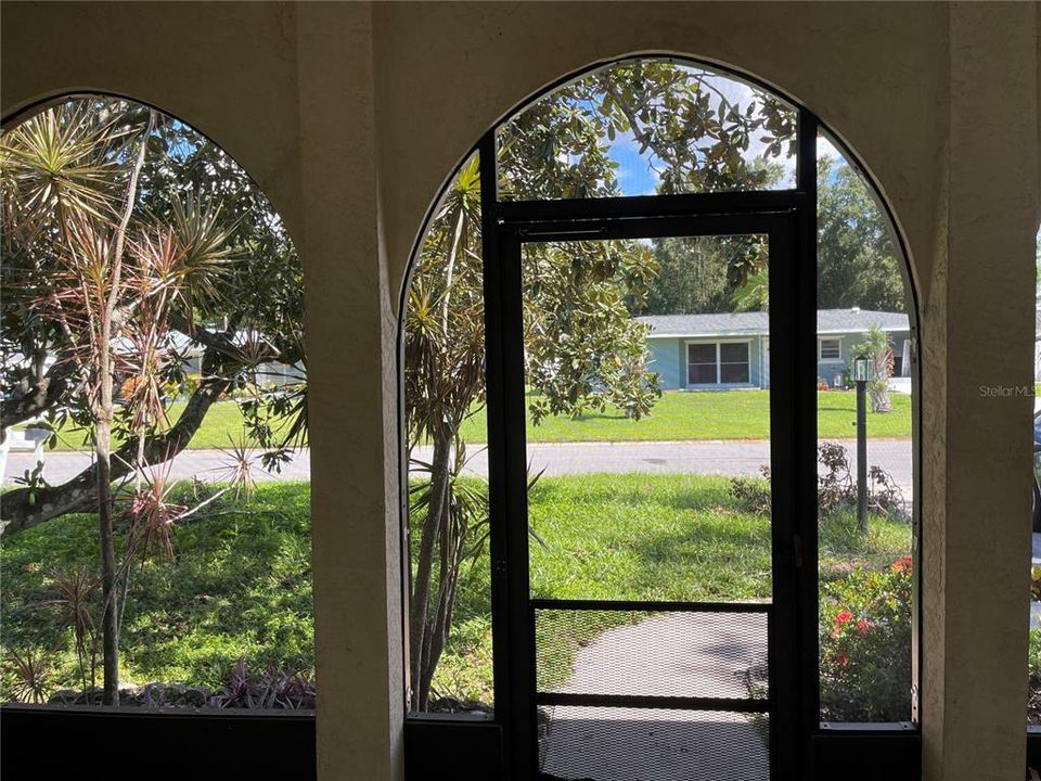 The entrance with the view of the front lawn.