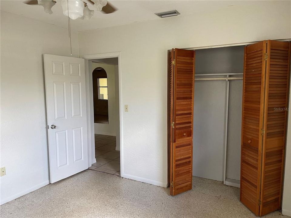 The bedroom with built-in closet