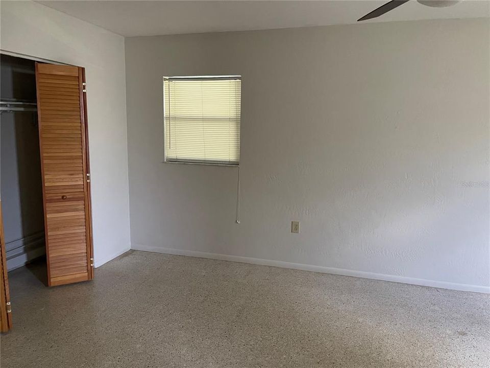 The bedroom boasts built-in closet.