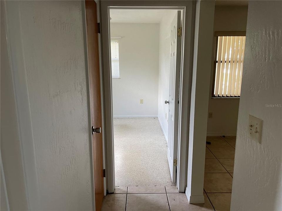 The hallway leading to the bedrooms and the bathroom.