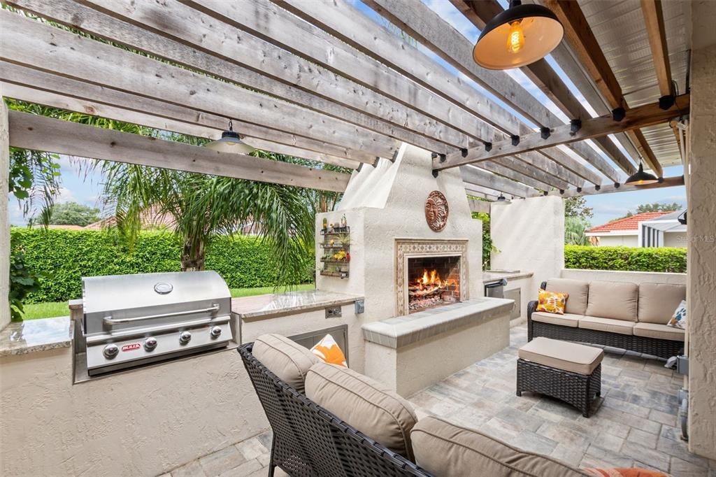 Lanai with fireplace and kitchen