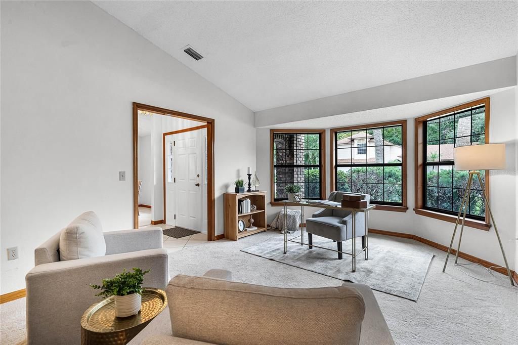 Formal Living Room with attractive bay window.