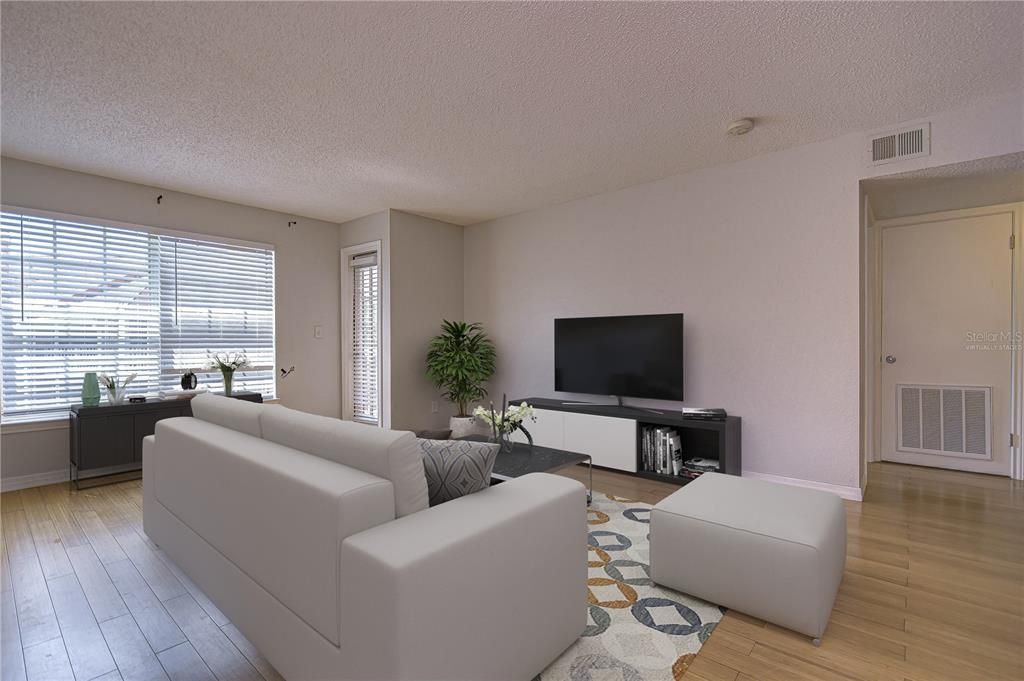 Virtually Staged - Living Room with Door to Balcony