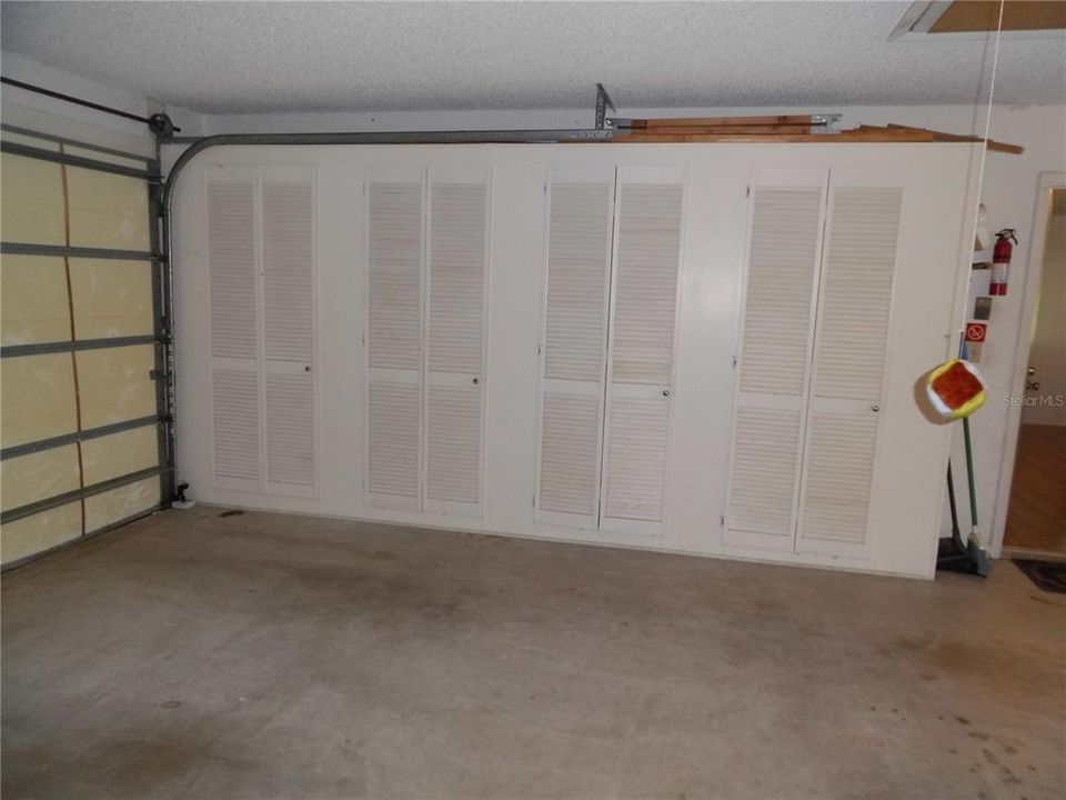 SHELVING FOR ADDITIONAL STORAGE IN GARAGE