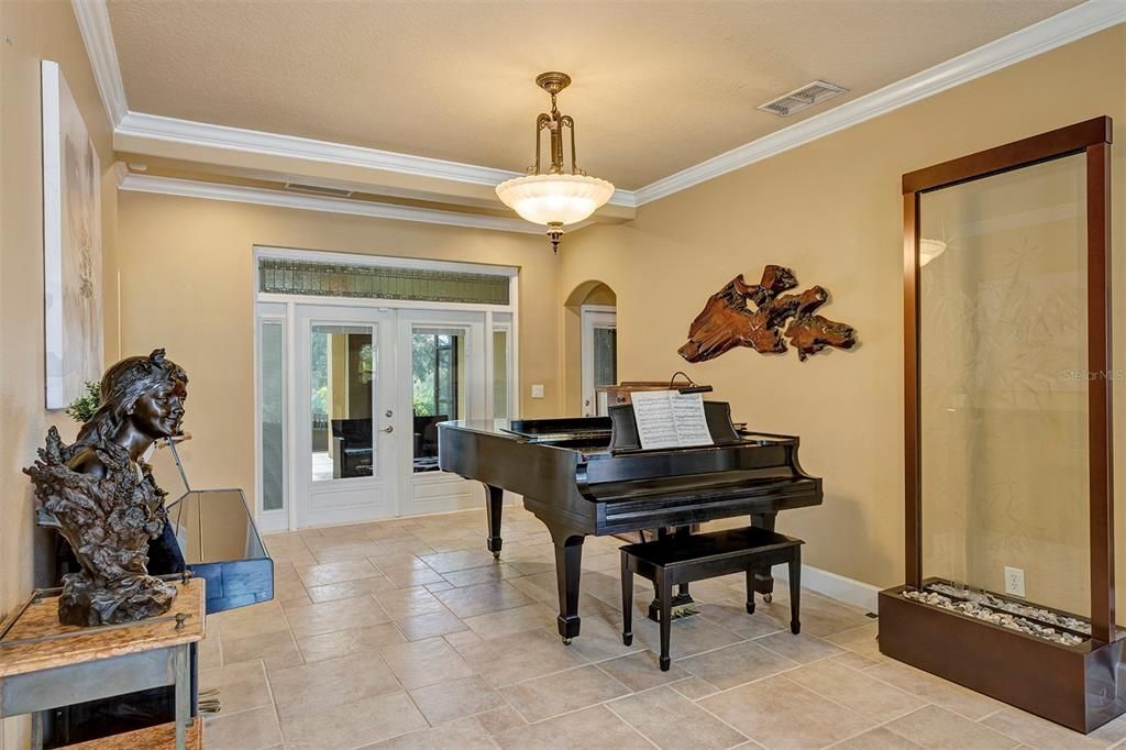 Formal living room is being used as a music room