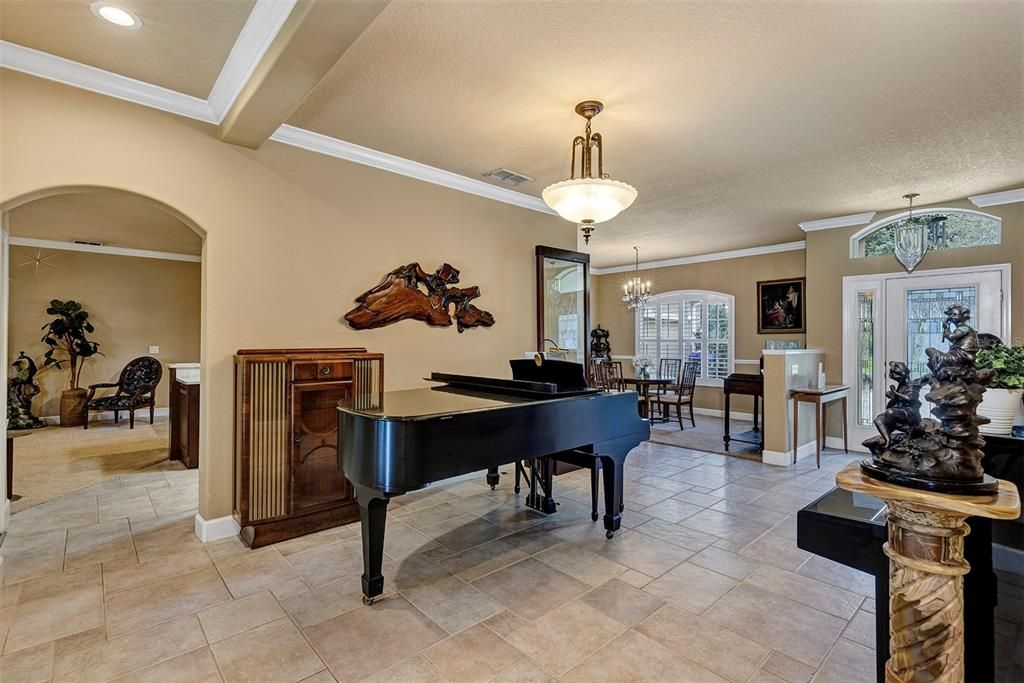 Formal living room is being used as a music room