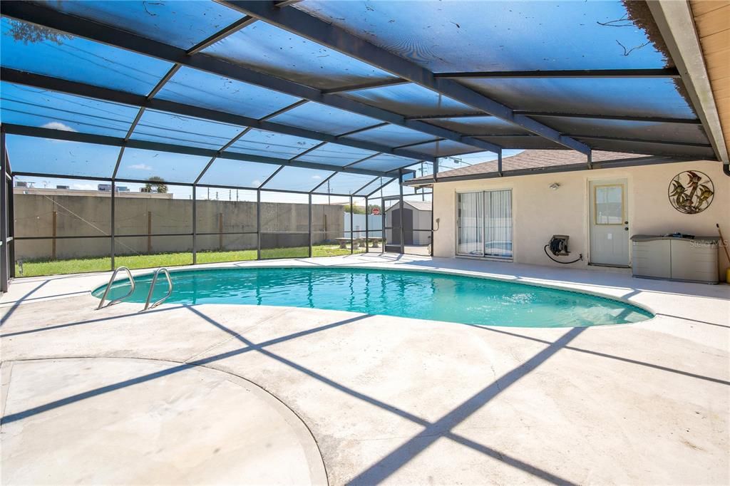 1200 sq. ft. screened in pool.