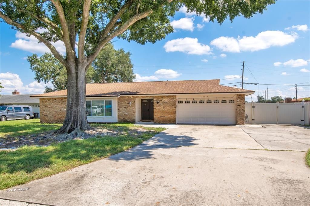 Front of Home w/ double swing gate for boat parking.